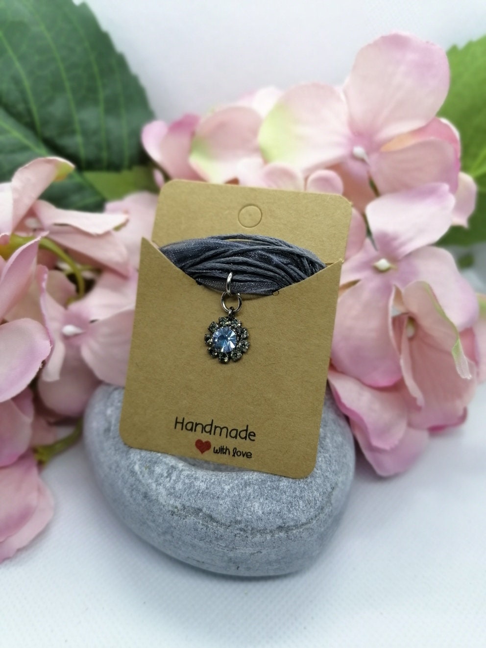 Crystal pendant on cord /organza necklace.