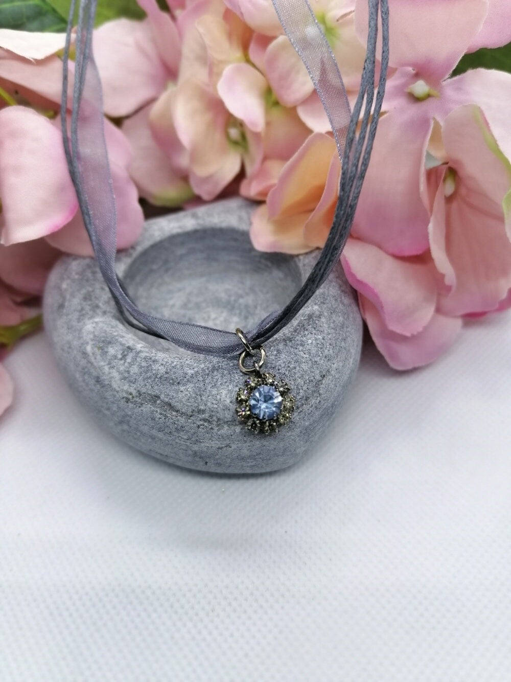 Crystal pendant on cord /organza necklace.