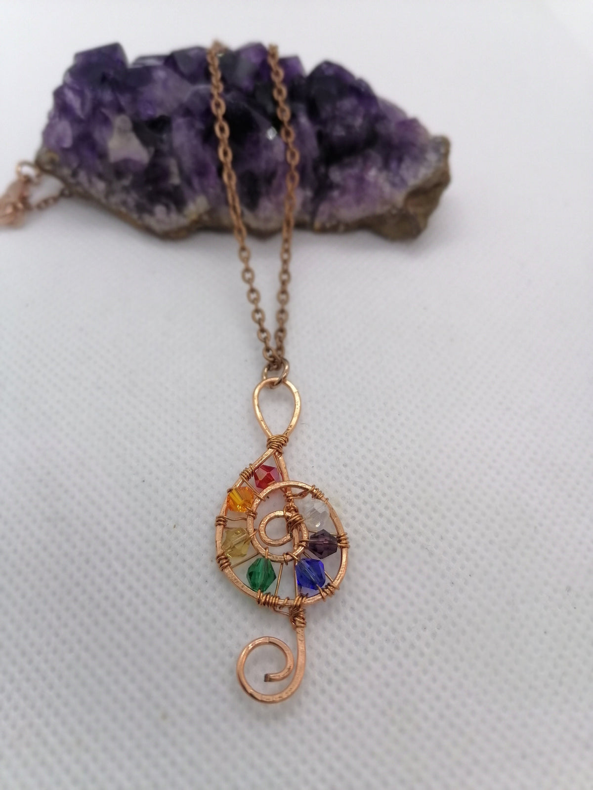 Copper wire wrapped treble clef beaded pendant