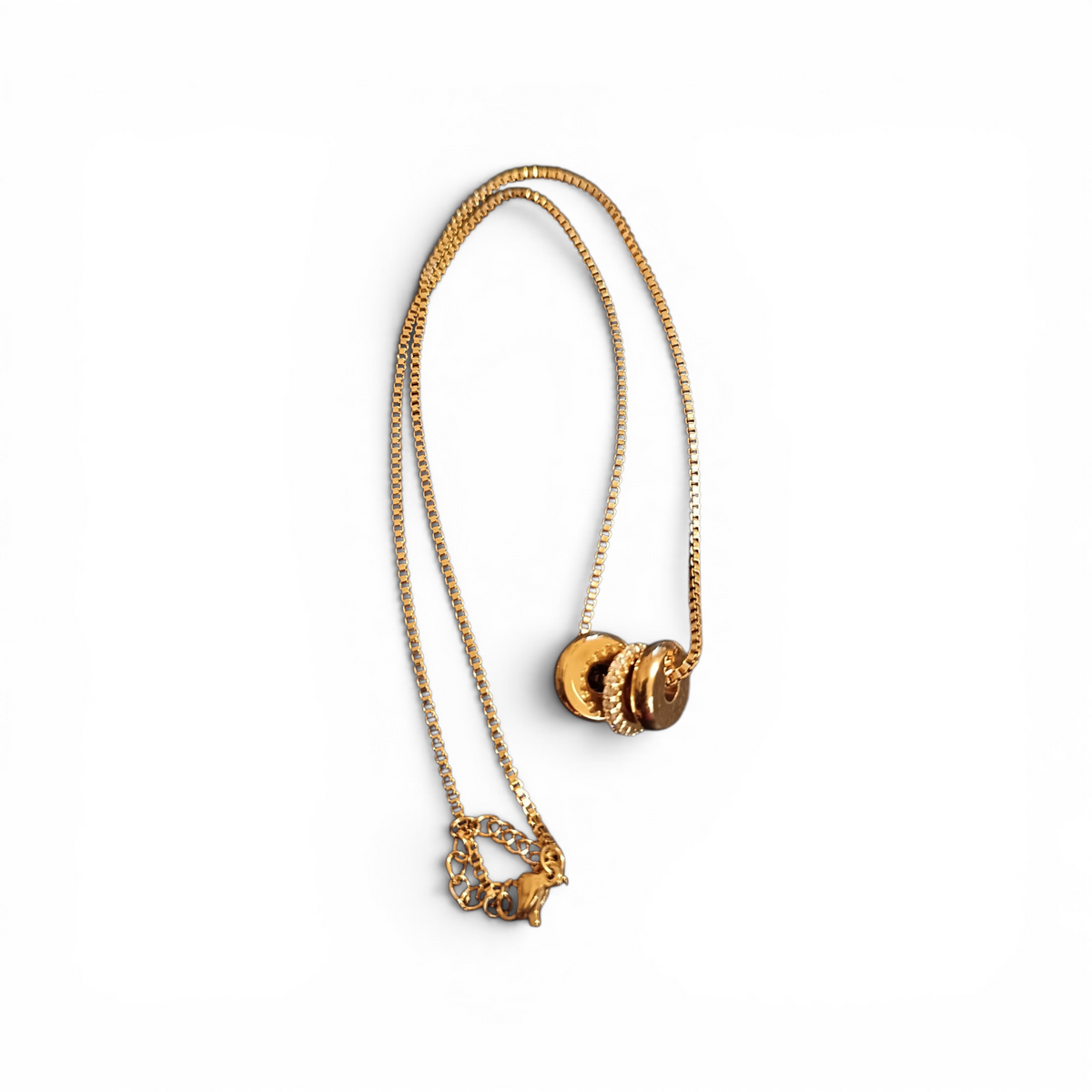 Gold Trilogy necklace.