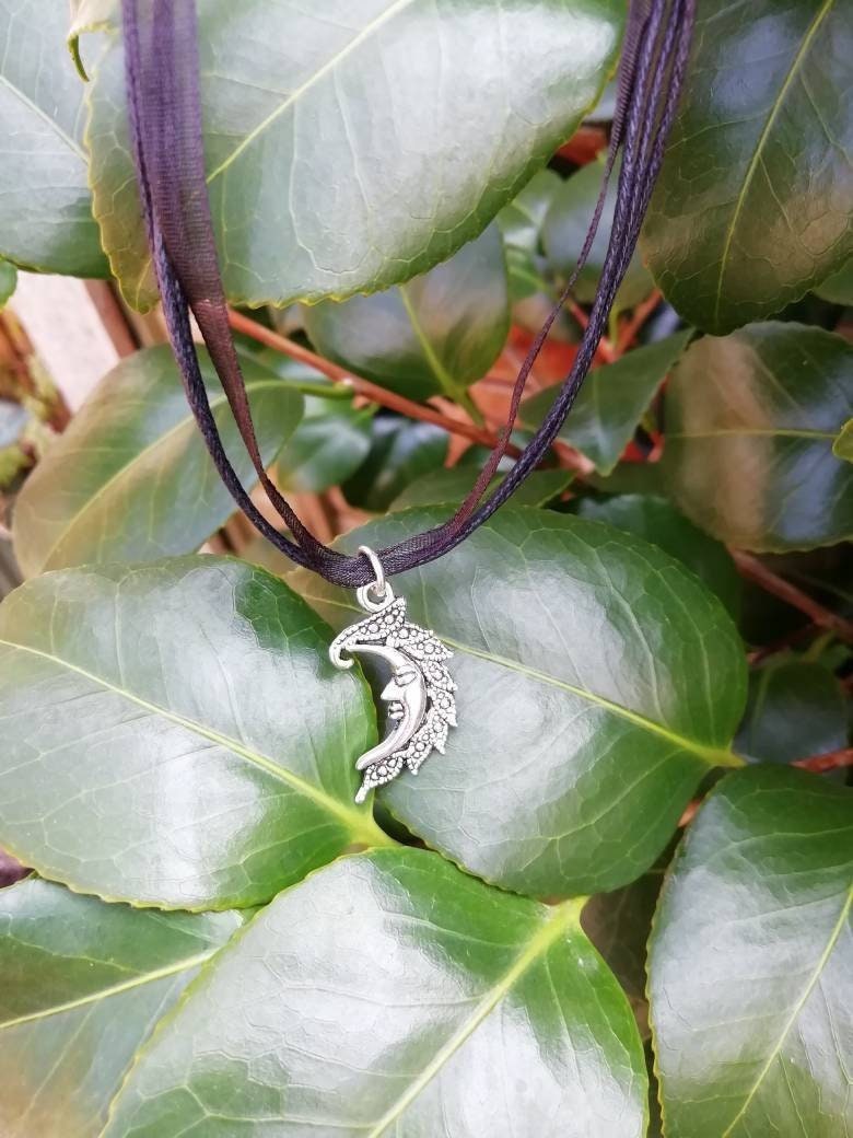 Crescent moon face necklace