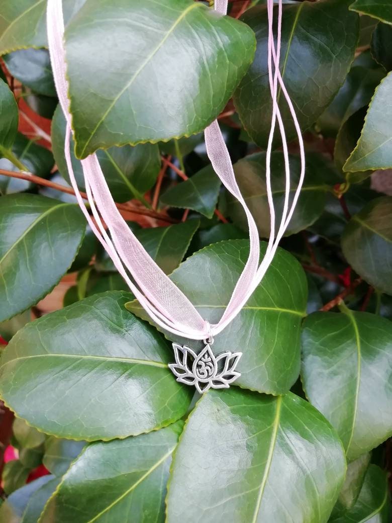 Lotus flower pendant on pink necklace