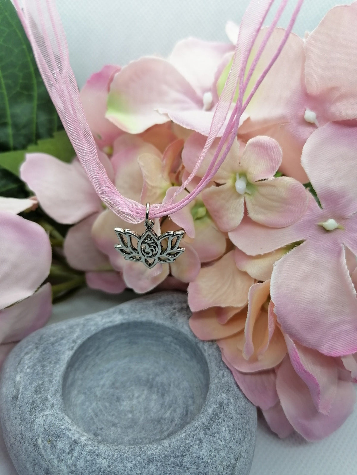 Lotus flower pendant on pink necklace