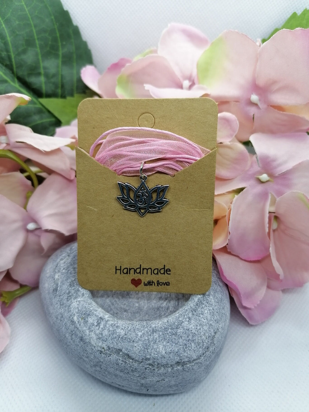Lotus flower pendant on pink necklace