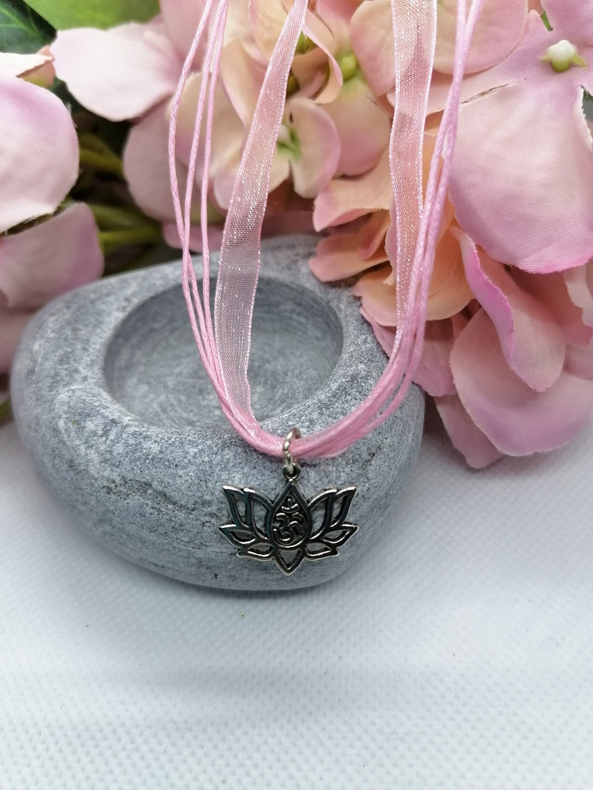 Lotus flower pendant on pink necklace