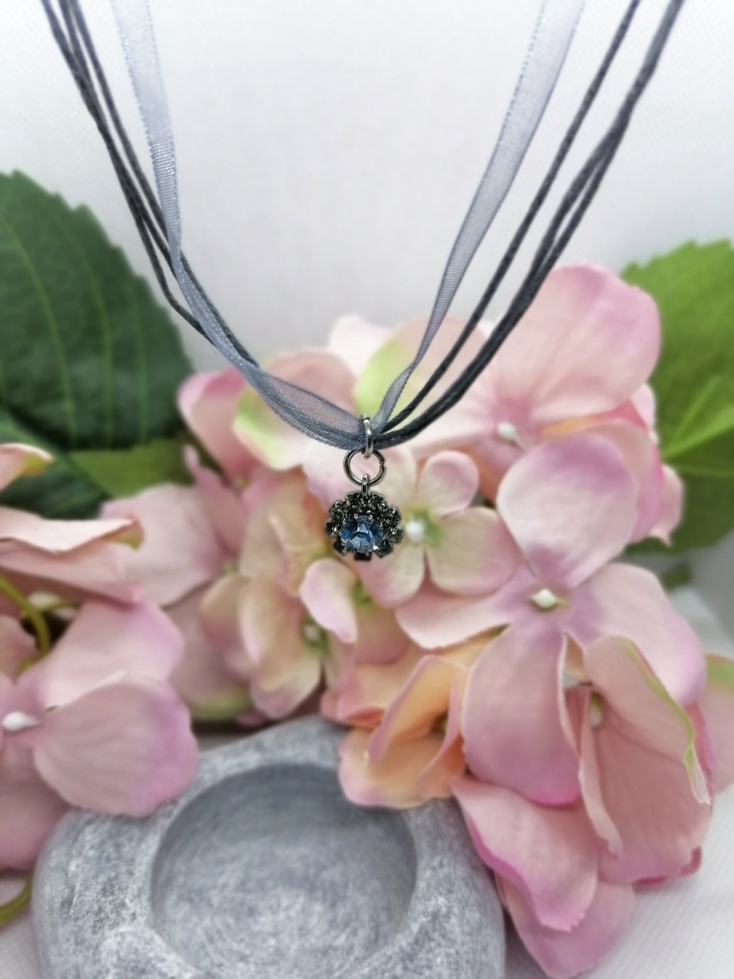 Crystal pendant on cord /organza necklace.