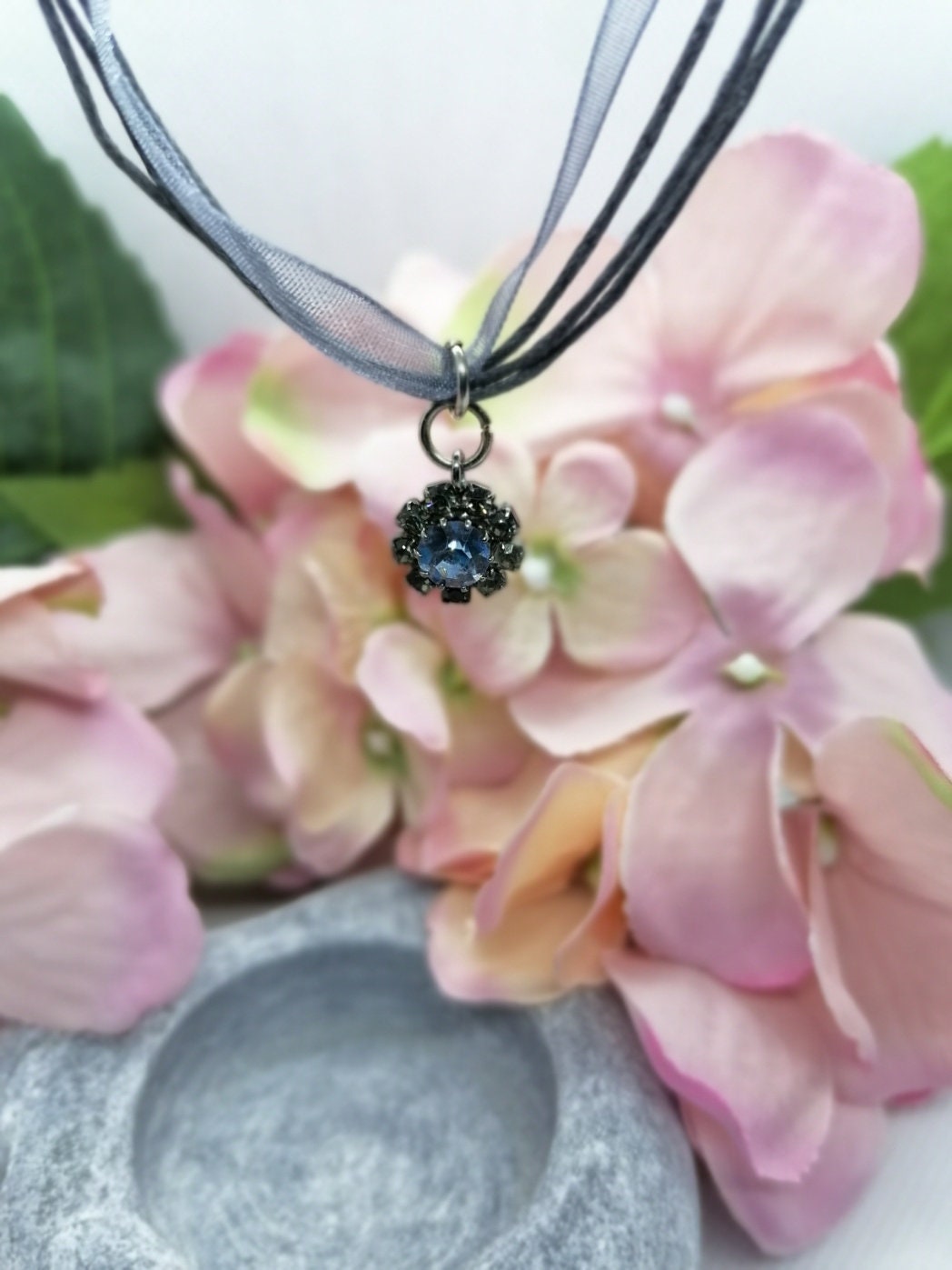 Crystal pendant on cord /organza necklace.