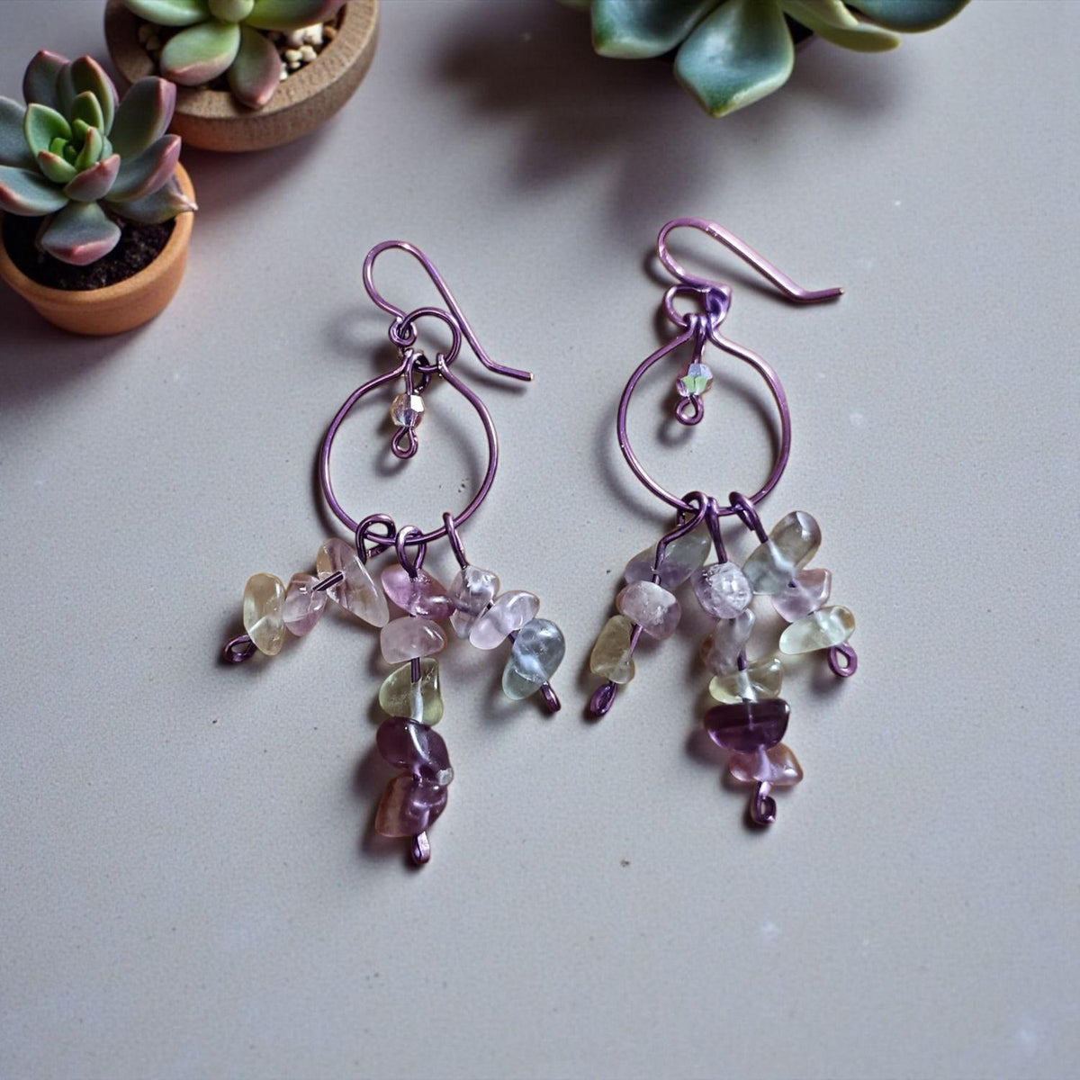 Natural flourite earrings .