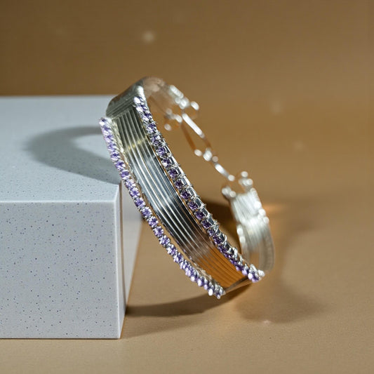 Silver crystal wire wrapped bangle .