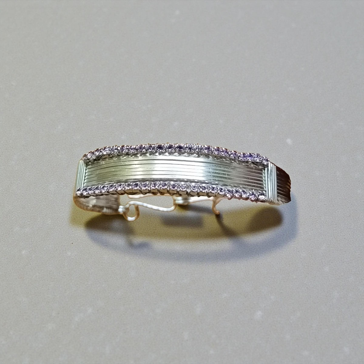 Silver crystal wire wrapped bangle .