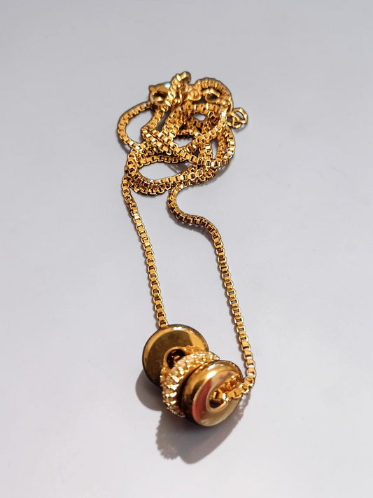 Gold Trilogy necklace.