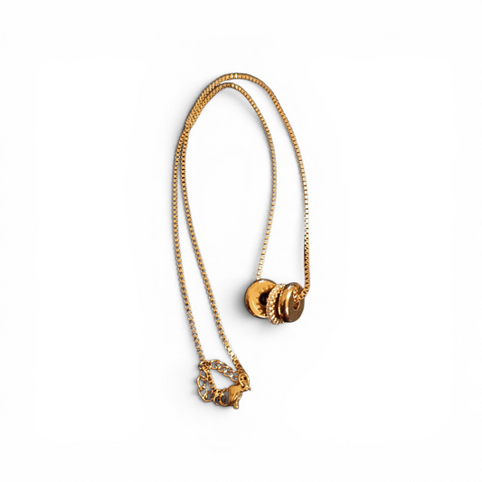 Gold Trilogy necklace.